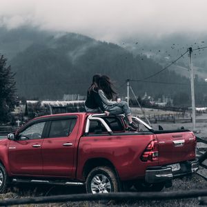 Preview wallpaper girls, journey, pickup, car, wind
