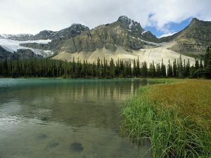 Preview wallpaper glacial lake, alberta, canada, mountains, trees, grass