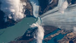 Preview wallpaper glacier, rocks, clouds, aerial view, terrain