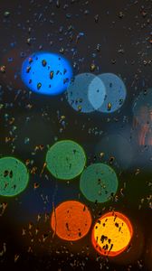 Preview wallpaper glare, colorful, drops, glass, rain