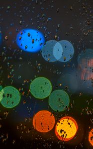 Preview wallpaper glare, colorful, drops, glass, rain