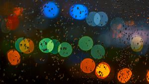 Preview wallpaper glare, colorful, drops, glass, rain