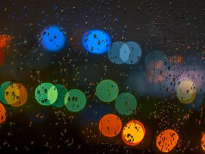 Preview wallpaper glare, colorful, drops, glass, rain