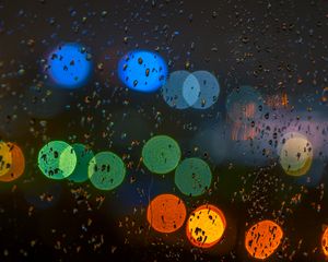 Preview wallpaper glare, colorful, drops, glass, rain