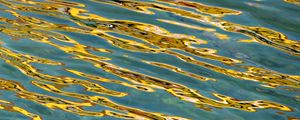 Preview wallpaper glare, water, ripples, golden, waves