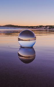 Preview wallpaper glass ball, ball, lake, reflection, sunset