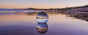 Preview wallpaper glass ball, ball, lake, reflection, sunset