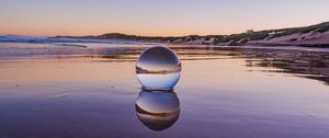 Preview wallpaper glass ball, ball, lake, reflection, sunset