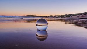 Preview wallpaper glass ball, ball, lake, reflection, sunset