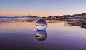 Preview wallpaper glass ball, ball, lake, reflection, sunset