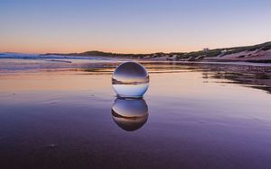 Preview wallpaper glass ball, ball, lake, reflection, sunset