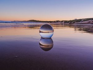 Preview wallpaper glass ball, ball, lake, reflection, sunset
