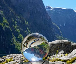 Preview wallpaper glass ball, ball, reflection, mountains, macro