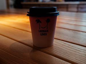 Preview wallpaper glass, coffee, inscription, table, wooden, shadow