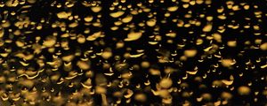 Preview wallpaper glass, drops, backlight, yellow, dark, macro