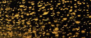 Preview wallpaper glass, drops, backlight, yellow, dark, macro
