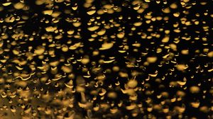 Preview wallpaper glass, drops, backlight, yellow, dark, macro