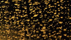 Preview wallpaper glass, drops, backlight, yellow, dark, macro