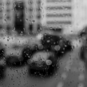 Preview wallpaper glass, drops, rain, cars, road, bw