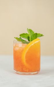 Preview wallpaper glass, juice, orange, mint, ice