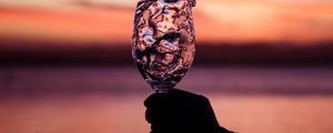 Preview wallpaper glass, splash, spray, hand, sunset