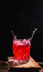 Preview wallpaper glass, spray, splash, drink, ice, red