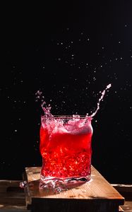 Preview wallpaper glass, spray, splash, drink, ice, red