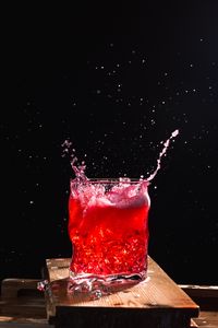 Preview wallpaper glass, spray, splash, drink, ice, red