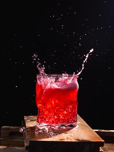 Preview wallpaper glass, spray, splash, drink, ice, red