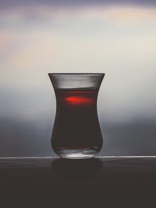 Preview wallpaper glass, tea, dark, drink, blur