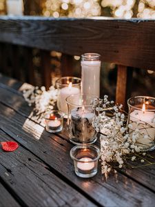 Preview wallpaper glasses, candles, flowers, table