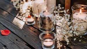 Preview wallpaper glasses, candles, flowers, table