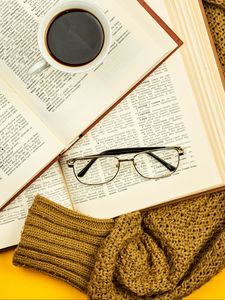 Preview wallpaper glasses, coffee, book, sweater, text