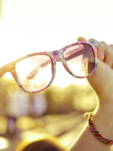 Preview wallpaper glasses, hands, sunlight