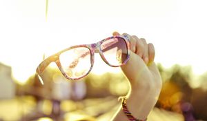 Preview wallpaper glasses, hands, sunlight