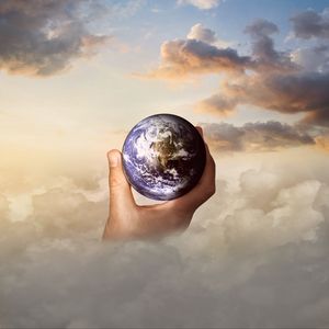 Preview wallpaper globe, hand, photoshop, clouds, world, travel