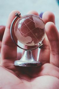 Preview wallpaper globe, souvenir, hand, glass