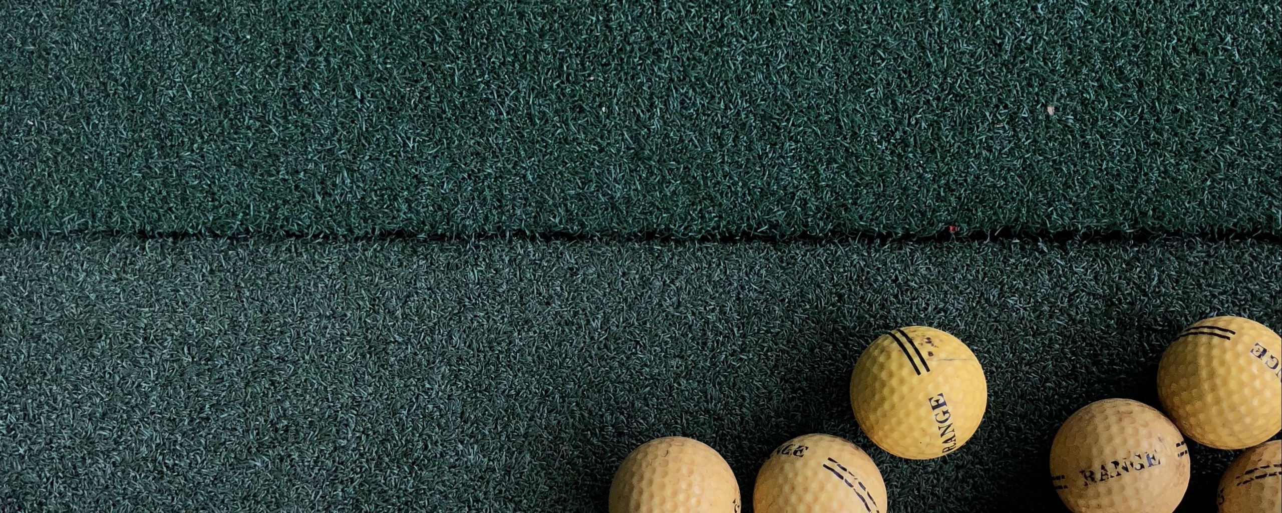 2560x1024 Wallpaper golf, balls, lawn, green, yellow