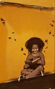 Preview wallpaper graffiti, child, reading, book, street art