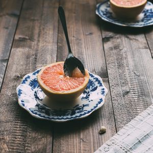 Preview wallpaper grapefruit, fruit, spoon, dessert