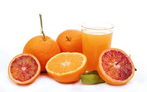Preview wallpaper grapefruit, orange, juice, glass, white background