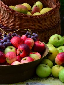 Preview wallpaper grapes, apples, basket, many