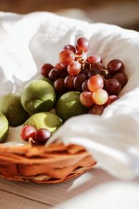 Preview wallpaper grapes, lime, fruit, basket, cloth
