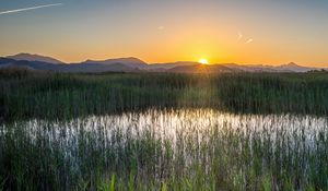 Preview wallpaper grass, field, mountains, sunrise, landscape