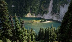 Preview wallpaper grass, slope, trees, island, mountains