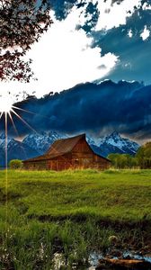 Preview wallpaper grass, trees, field, river, sky, clouds, building