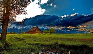 Preview wallpaper grass, trees, field, river, sky, clouds, building