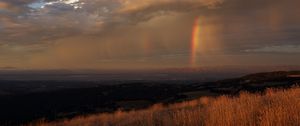 Preview wallpaper grass, valley, rainbow, nature