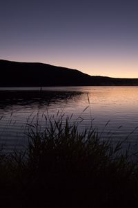 Preview wallpaper grasses, dusk, lake, hill