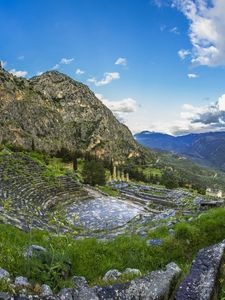 Preview wallpaper greece, delphi, mountain, grass, sky